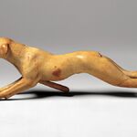 Механическая собака: Древнеегипетский "хороший мальчик" с красным языком и "лаем".