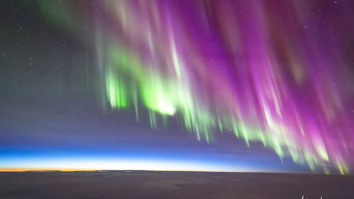 Северное сияние с высоты 36 тысяч футов: пилот-фотограф делится уникальными кадрами