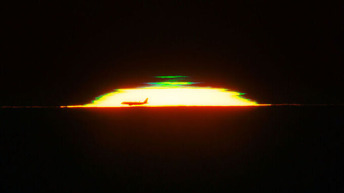 Зелёная вспышка: минутное чудо природы, помогающее изучать Вселенную